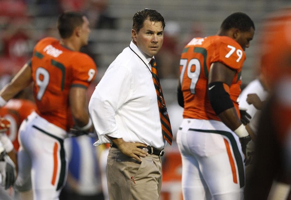 University of Miami head coach Al Golden looks on in the season opener against Maryland on Sept. 5. Over the summer, 15 of his players were implicated in a scandal involving a booster who says he gave cash and gifts to players between 2002 and 2010. (AP)