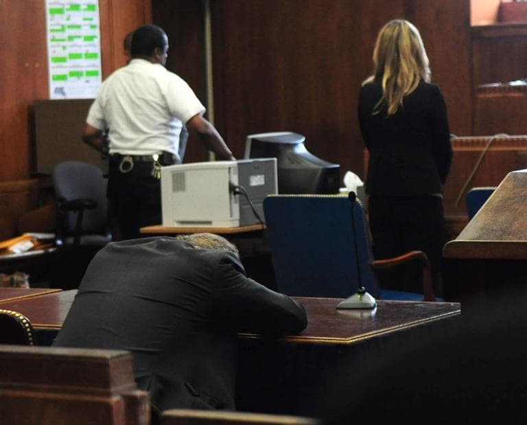 Wilson reacts after a client is convicted on first-degree murder charges in May, the same trial in which Wilson was found in contempt of court. The client comforted Wilson, though he'd just been convicted. (Obtained by WBUR)