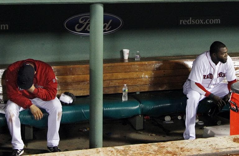 Red Sox pitcher Alfredo Aceves, left, and designated hitter David Ortiz haven't had a lot to cheer about in the Sox dugout lately. (AP)
