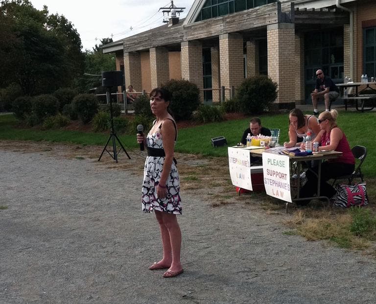Kimberly Flynn, mother of murdered social worker Stephanie Moulton, leads a rally in Peabody in support of Stephanie's Law. (Deborah Becker/WBUR)