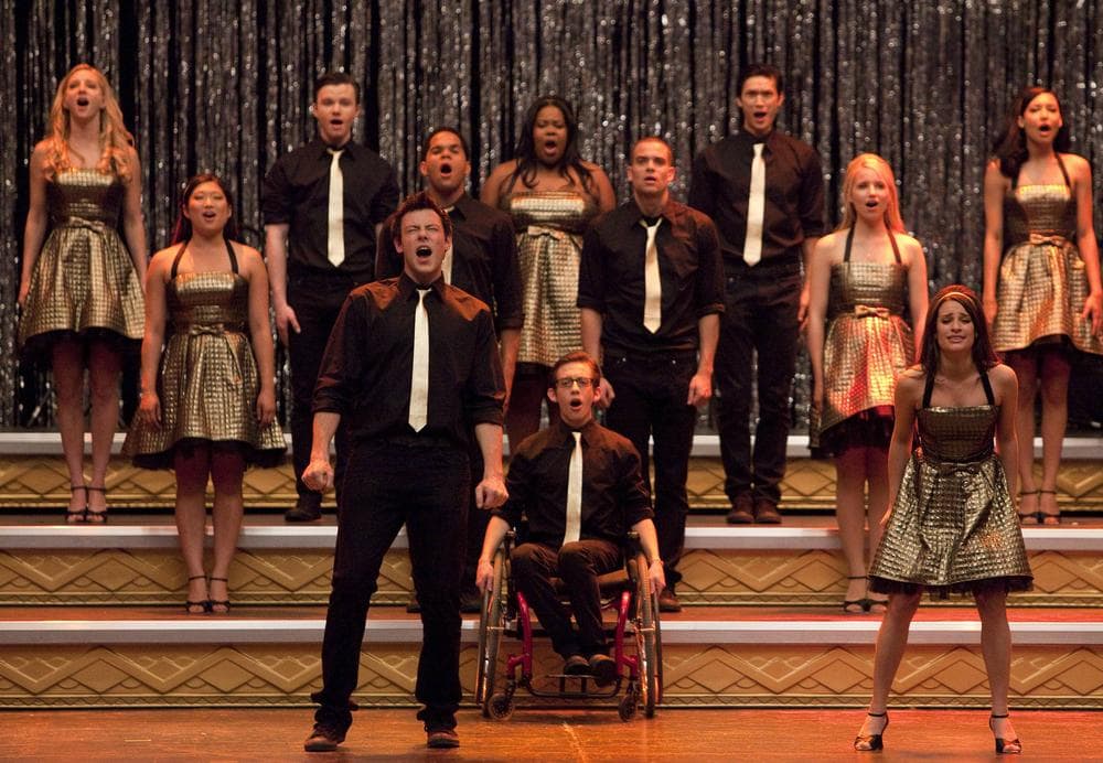 The cast of "Glee," front row from left, Cory Monteith, Kevin McHale and Lea Michele, center row from left, Jenna Ushkowitz, Dijon Talton, Mark Salling and Dianna Agron, back row from left, Heather Morris, Chris Colfer, Amber Riley, Harry Shum Jr. and Naya Rivera perform "Don't Stop Believing." (AP/Fox)