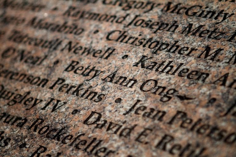 Betty Ong's name is seen on the Sept. 11 memorial in the Boston Public Garden. (Jesse Costa/WBUR)