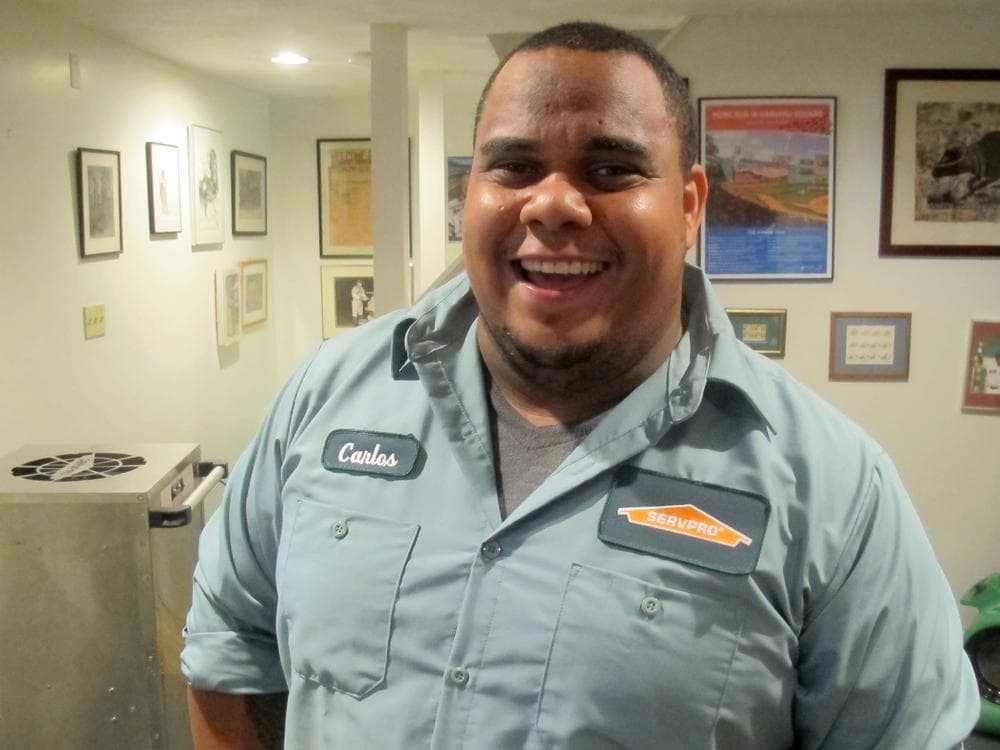 Carlos Peña found more than just flood damage in Bill Littlefield's basement after Hurricane Irene. (Bill Littlefield/Only A Game)