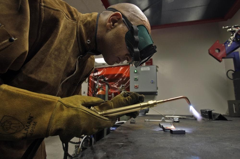 A software engineer works on his welding skills at the at a workshop space created for  Google employees in Mountain View, Calif. (AP)