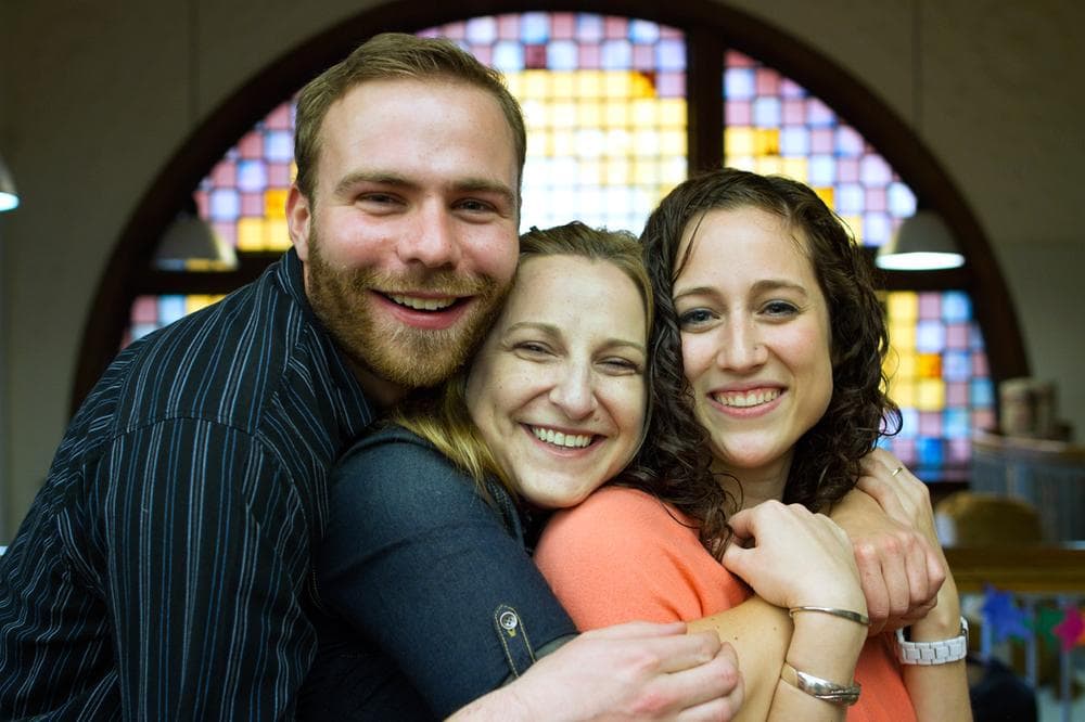 Embracing after the scene (Jesse Costa/WBUR)