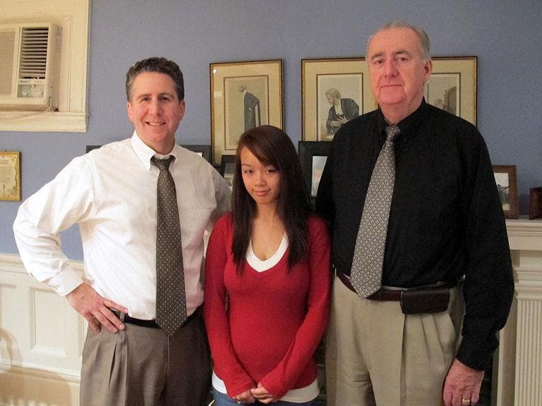 Nga Truong, with lawyers Jeff Richards, left, and Ed Ryan, on Monday. Ryan has called Truong's 2008 interrogation by Worcester police "psychological torture." (Lisa Tobin/WBUR)