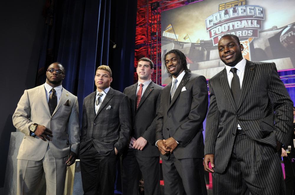 Heisman Trophy finalists, from left, Alabama's Trent Richardson, LSU's Tyrann Mathieu, Stanford's Andrew Luck, Baylor's Robert Griffin III, and Wisconsin's Montee Ball pose after the College Football Awards show in Lake Buena Vista, Fla. on Thursday. (AP)