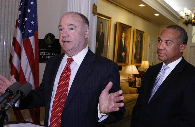 Stephen Crosby speaks as Gov. Deval Patrick looks on during a State House news conference Tuesday. (AP)