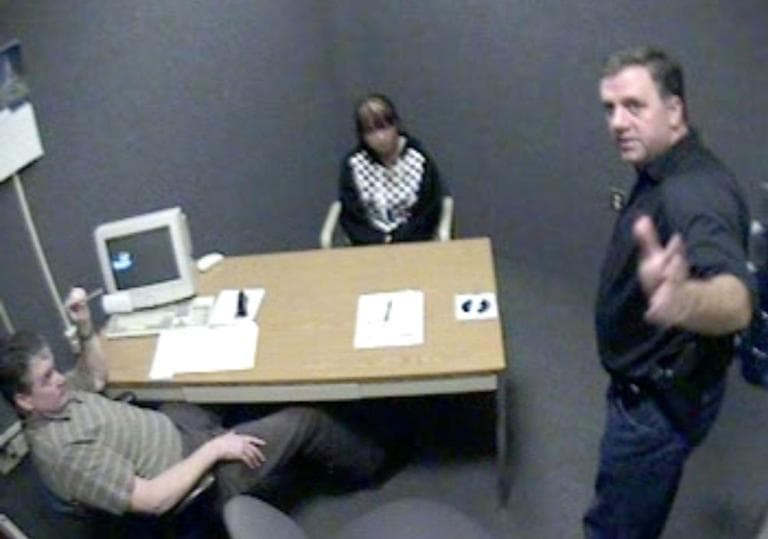 Worcester Police Sgt. Kevin Pageau, right, and Detective John Doherty, left, interrogate Nga Truong, 16, following the 2008 death of her baby boy. (WBUR screenshot)