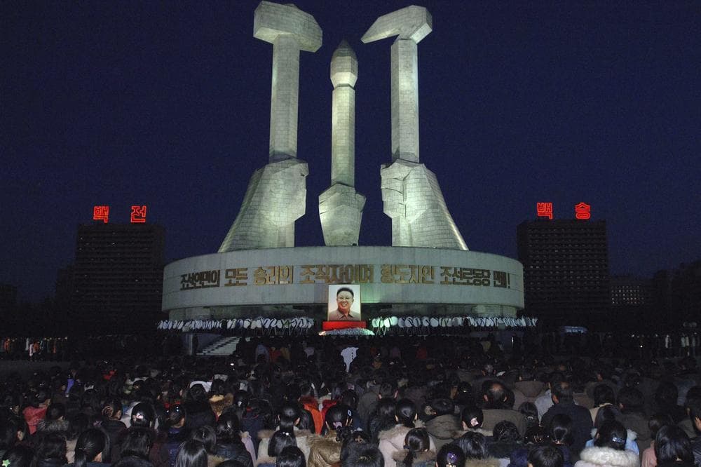 North Koreans gather to pay respects to their late leader Kim Jong Il in front of a monument to mark the founding of Workers' Party in Pyongyang, North Korea. (AP) 