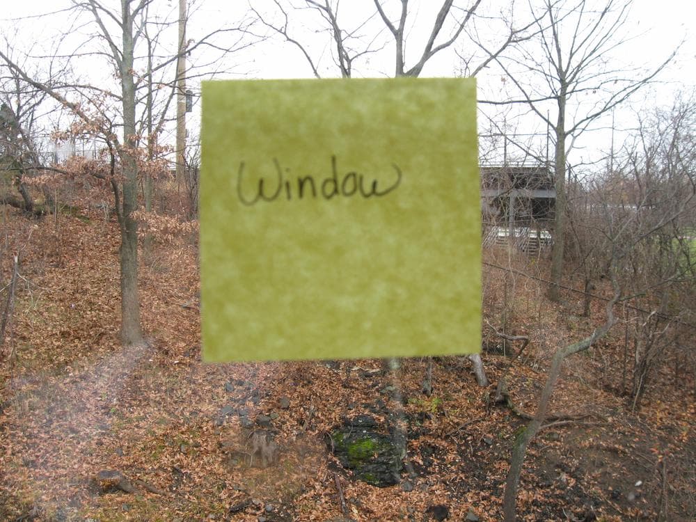 Small sticky notes with English words on them &mdash; like "window" and "table" &mdash; are scattered throughout Spaulding to help Libyan patients learn the names of common objects. (Sacha Pfeiffer/WBUR)