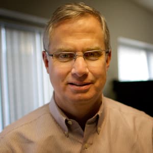 Headshot of Tom Melville