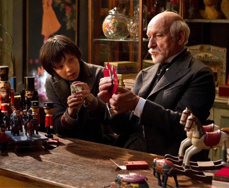 In this image released by Paramount Pictures, Asa Butterfield portrays Hugo Cabret, left, and Ben Kingsley plays Georges Méliès in a scene from "Hugo." (AP)