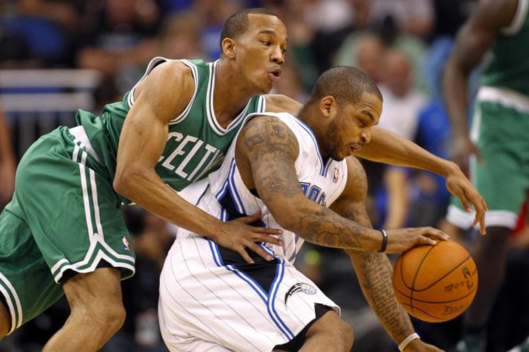 Orlando Magic's Jameer Nelson, right, drives past Boston Celtics' Avery Bradley during the first half of an NBA basketball game on Thursday, in Orlando, Fla. (AP)