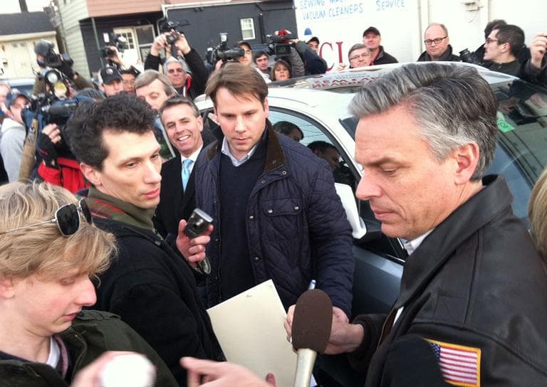 Jon Huntsman signs autographs in Nashua, N.H., Monday. (Martha Bebinger/WBUR)