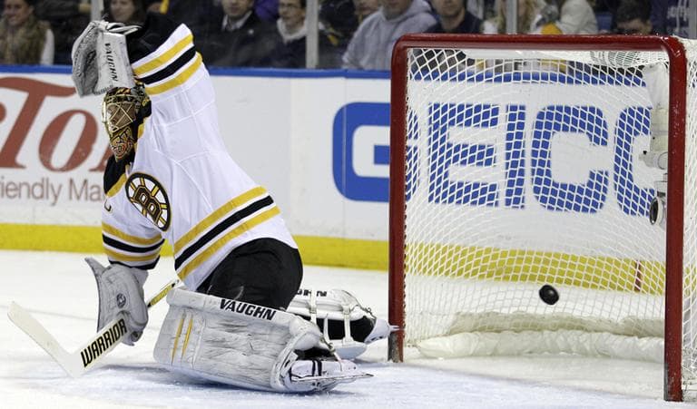 Buffalo Sabres' Christian Ehrhoff scores on Bruins goalie Tuukka Rask, during the first period of an NHL hockey game in Buffalo, N.Y., Wednesday. (AP Photo)