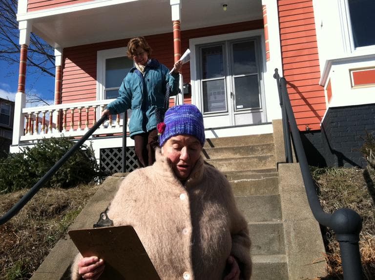 Karen Bell and Mary Kingsley try to contact Gloucester Democrats and independents who have voted in at least one Democratic primary but failed to vote in the special election for the U.S. Senate in 2010. (Fred Thys/WBUR)