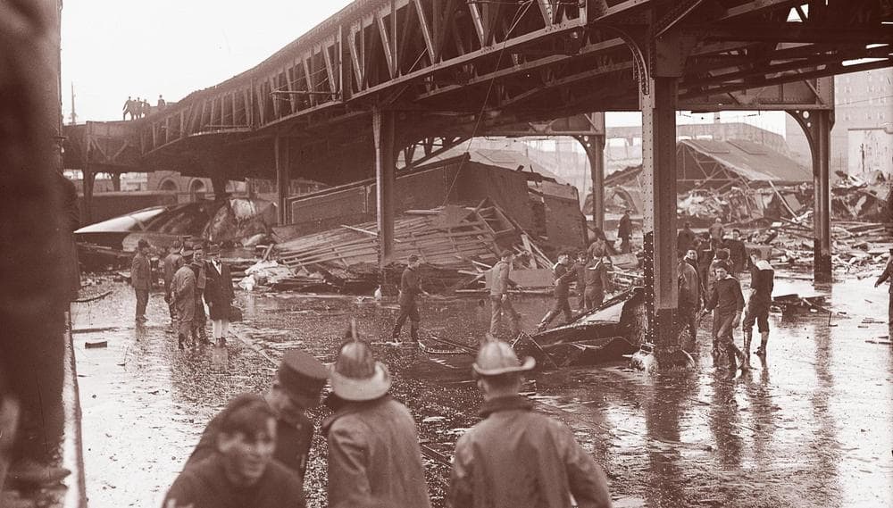 Wreckage under elevated train tracks from the molasses disaster (Courtesy of &quot;The Great Molasses Flood,&quot; by Deborah Kops)