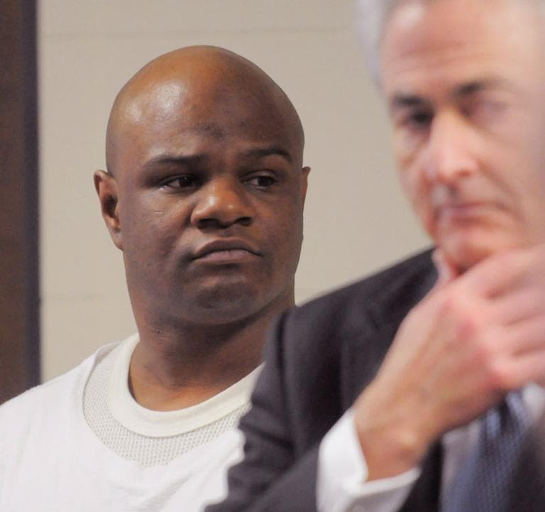 Kimani Washington, left, stands with his attorney, John Salsburg, during an arraignment last year. Washington testified again in the Mattapan murders trial on Wednesday. (AP File)