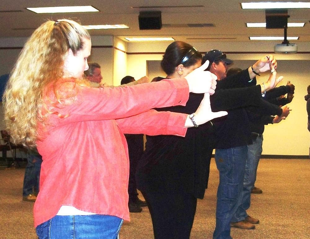 Workers taking part in a morning stretching routine at Duke Energy. (Duke Energy Corp.)