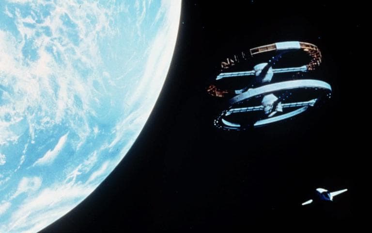 This is scene from Stanley Kubrick's 1968 film, "2001: A Space Odyssey," showing a space shuttle, lower right, approching a space station. (AP)