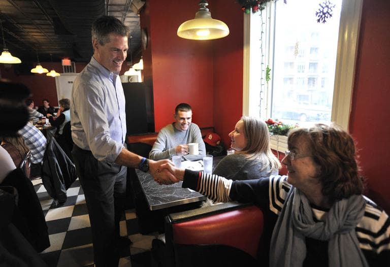 Sen. Scott Brown greets supporter Jo MacDonald of Salem, Mass., right, at Mul's Diner in Boston, Wednesday, Dec. 28, 2011. (AP)
