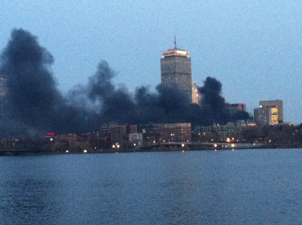 Smoke from the electrical fire as seen from Memorial Drive in Cambridge (Bianca Vazquez Toness/WBUR)