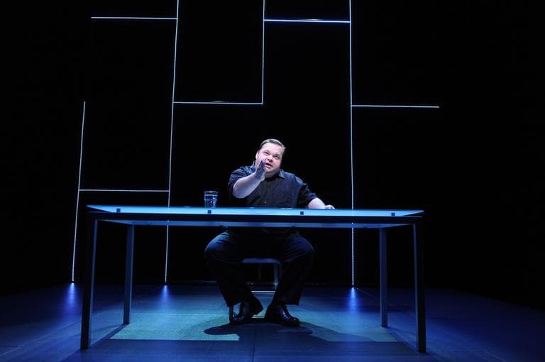 Mike Daisey is shown in a scene from "The Agony and The Ecstasy of Steve Jobs." (AP Photo/Stan Barouh)