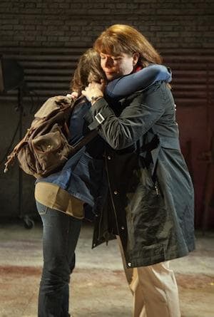 Sarah Drake and Kerry A. Dowling reconcile in a scene from the Speakeasy Stage Company's Next to Normal (Saglio Photography Inc.)