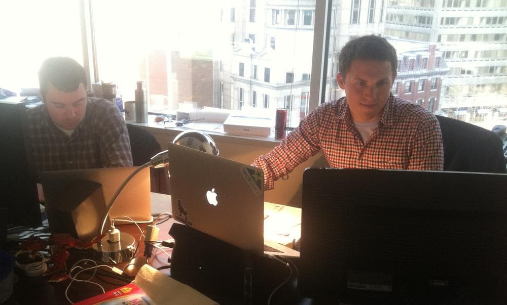 The web development start-up Terrible Labs is currently squeezed into a single-room at One Financial Center. (Curt Nickisch/WBUR)
