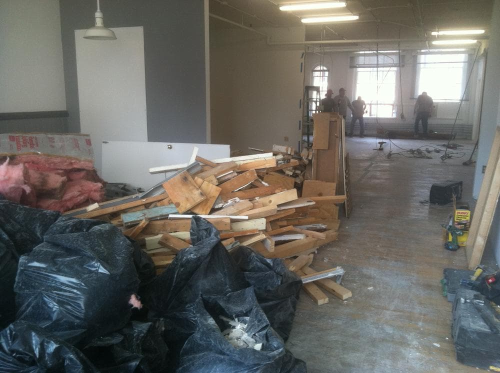 Start-ups are renovating offices by creating open floor plans to enhance collaborative innovation. (Curt Nickisch/WBUR)