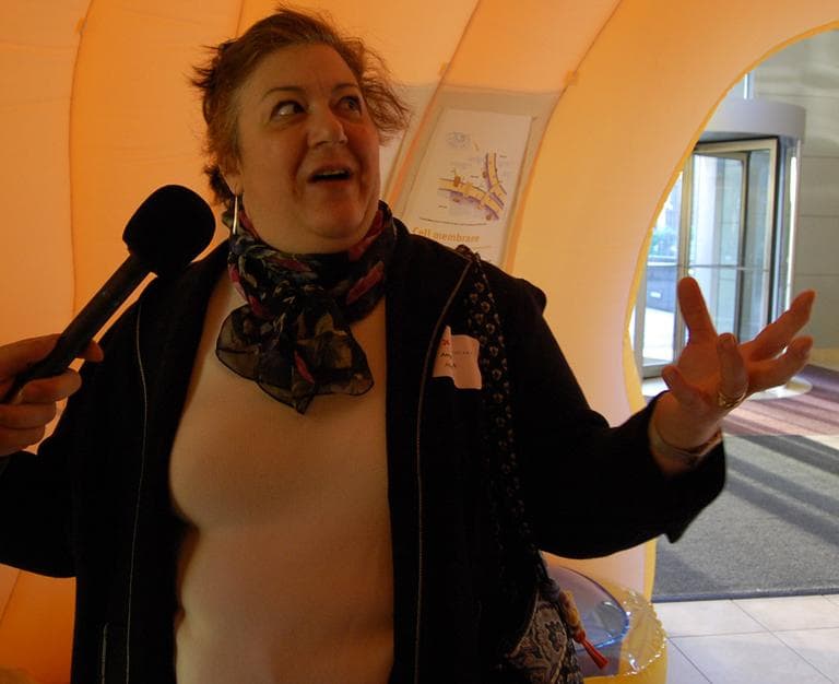 Amy Dasch, CEO of Abayzyme, touring The Giant Cell. (Aayesha Siddiqui/WBUR)