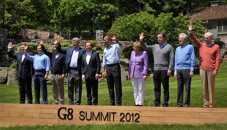 World leaders attend the family photo session during the G-8 Summit at Camp David. From left: European Commission President Jose' Manuel Barroso, Russian Prime Minister Dmitry Medvedev, Japanese Prime Minister Yoshihiko Noda, Canadian Prime Minister Stephen Harper, French President Francois Hollande, U.S. President Barack Obama, German Chancellor Angela Merkel, British Prime Minster David Cameron, Italian Prime Minister Mario Monti and European Council President Herman Van Rompuy. (Philippe Wojazer/AP)