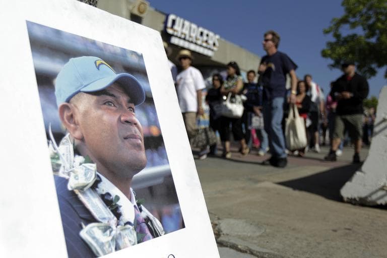 An image of football player Junior Seau in front of Qualcomm Stadium as fans arrived for a public memorial service in early May in San Diego. (AP)