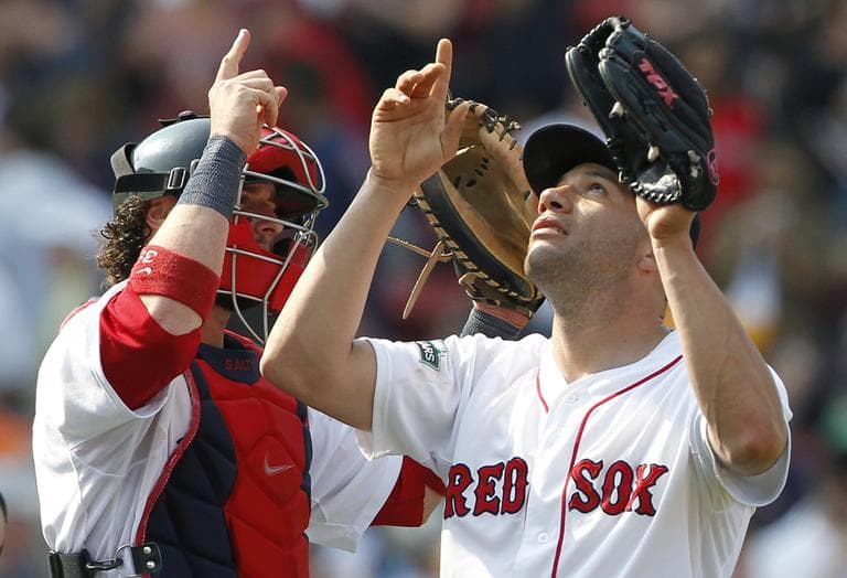 Boston Red Sox closer Alfredo Aceves, right, and catcher Jarrod Saltalamacchia celebrate after defeating the Detroit Tigers 7-4. (AP)