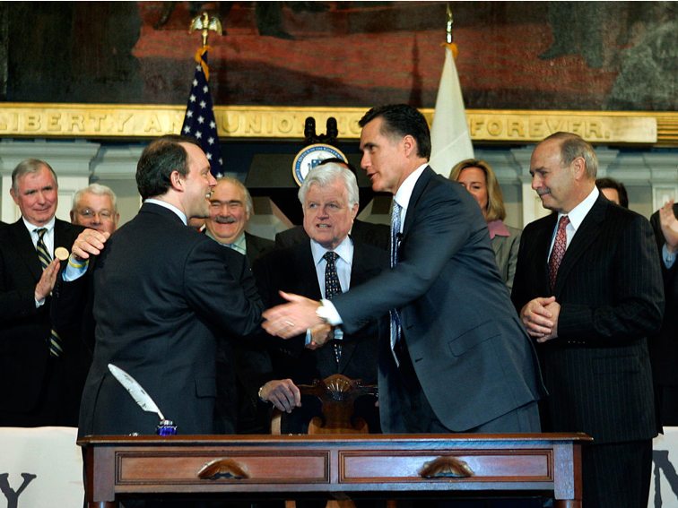 20 years after passing nation-leading health care law, Mass. braces for new challenges