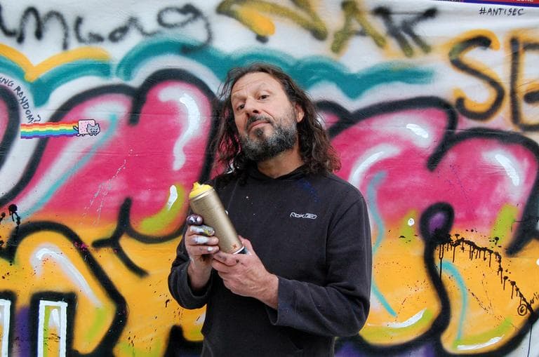 Charlie Schmidt, creator of Keyboard Cat, in front of his pop up art project at ROFLCon. (Aayesha Siddiqui/WBUR)