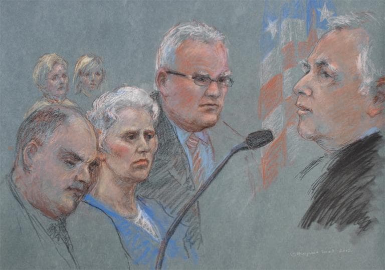 U.S. District Judge Douglas Woodlock, right, sentences Catherine Greig, center, to eight years in prison for helping James "Whitey" Bulger stay on the run. (Margaret Small for WBUR)