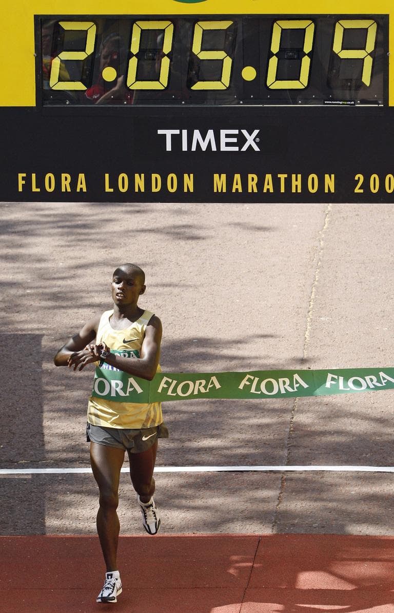 Kenya's Sammy Wanjiru crosses the finish line to win the men's London Marathon in London in 2009. (AP)