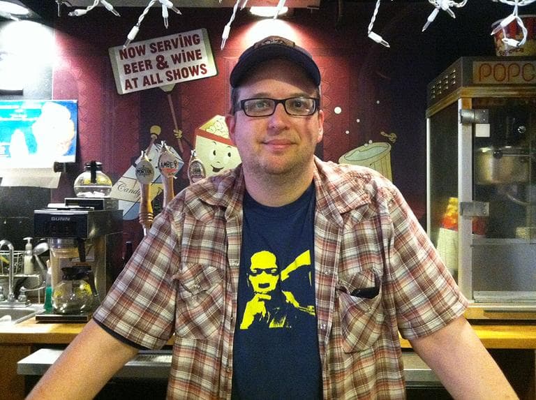 Ned Hinkle, creative director at the Brattle Theatre, just a few blocks away from the AMC Loews that is going dark on July 8 (Andrea Shea/WBUR)