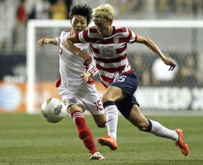 United States' Megan Rapinoe (15) and China's Xu Yanlu (15) fight for ball control during the second half of their international friendly soccer match in Chester, Pa. on May 27. (AP)