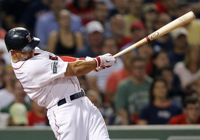 Red Sox's Cody Ross follows through on a three-run home run in the third inning on Wednesday. (AP Photo/Michael Dwyer)