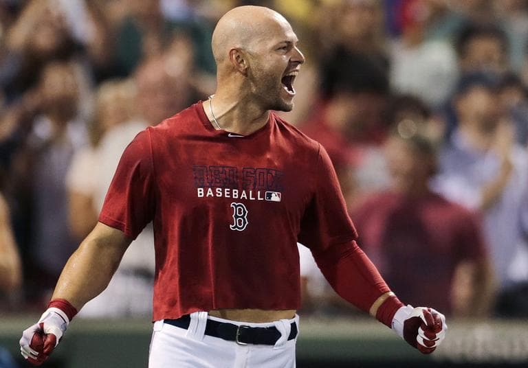 Red Sox's Cody Ross celebrates his home run in the ninth inning against the Chicago White Sox at in Boston on Thursday. (AP Photo/Charles Krupa)