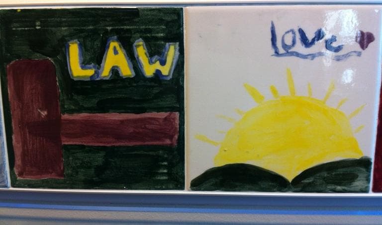 Tiles made by at-risk children line the walls of Cambridge Family & Children's Services. (Fred Bever for WBUR)