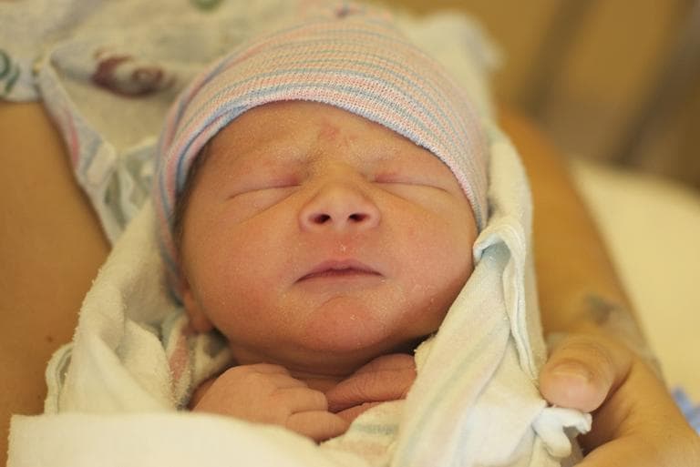 In this photo provided by the University of Colorado Hospital, Katie Medley holds her newborn son Hugo Jackson Medley at the hospital in Aurora, Colo. in July. (AP/University of Colorado Hospital)