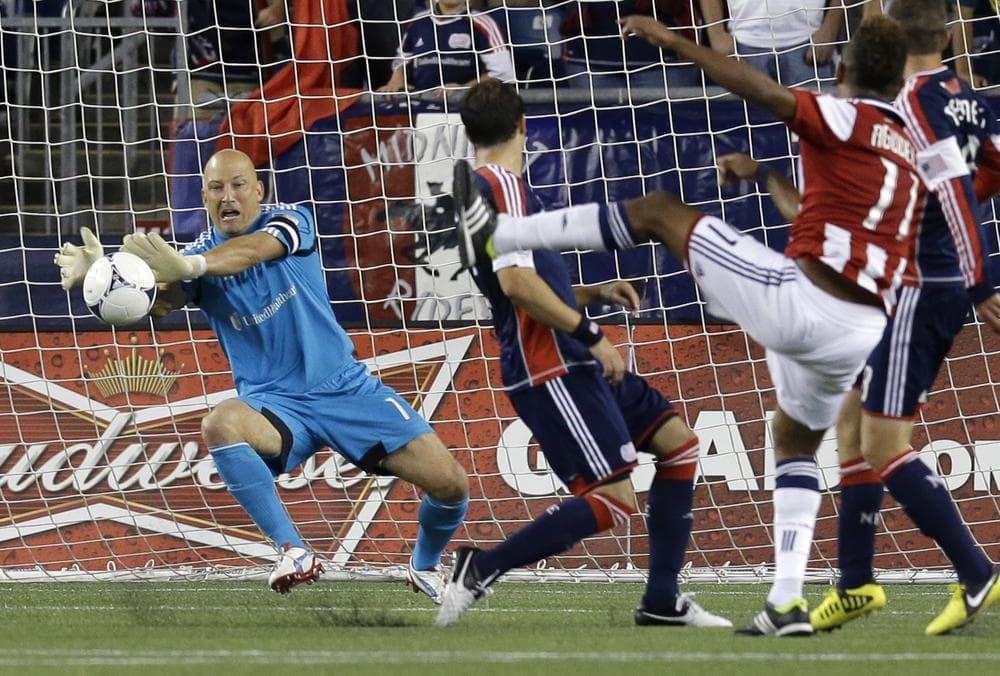 New England Revolution goalkeeper Matt Reis makes a save against a shot by Chivas USA forward Juan Agudelo during the second half of last night's match in Foxborough, which ended in a 3-3 tie. (AP Photo
