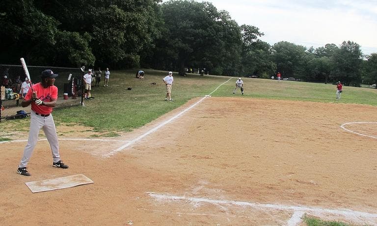 Reinaldo Linares, 65, played on the Cuban national baseball team for 11 seasons. His father, Rogelio, played in the U.S. Negro Leagues in the 1950s. Here, Linares bats in “The Friendship Game” in Boston. (Doug Tribou/WBUR)