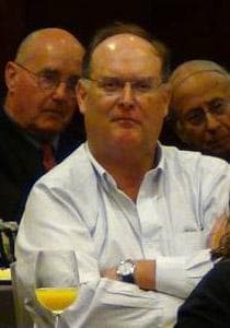 Peter Sullivan, who runs a small real estate business, listens for tips on how to cut, not just control, rising health care costs. (Courtesy of  Associated Industries of Massachusetts)