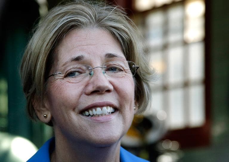 Elizabeth Warren speaks to reporters after a tour of the Lexington Fire Department Monday. (AP)