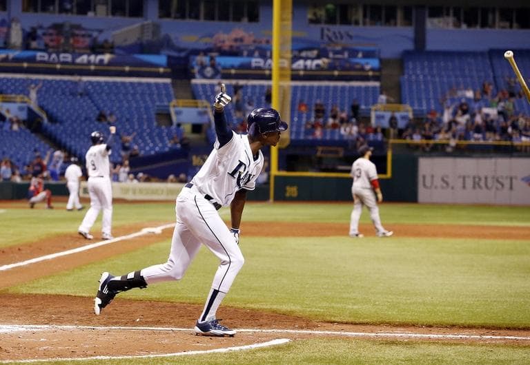 Tampa Bay Ray's B.J. Upton reacts after hitting the game winning home run in the bottom of the ninth inning to  give the Rays a 7-4 win over the Boston Red Sox . (AP/Scott Iskowitz)